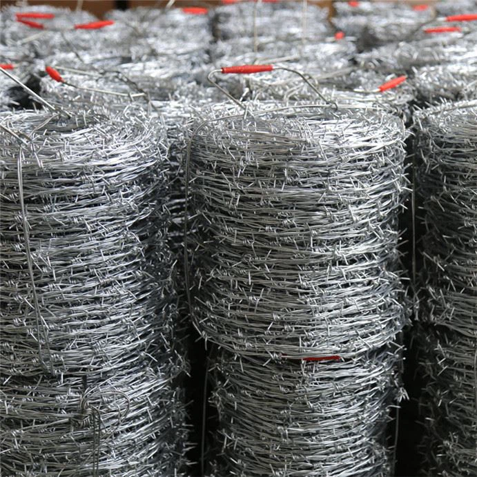 Barbed Wire On Top Of Fence